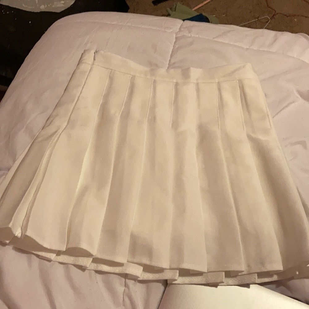 White pleated skirt